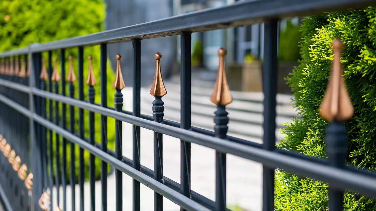 A modern deck with a sleek metal railing