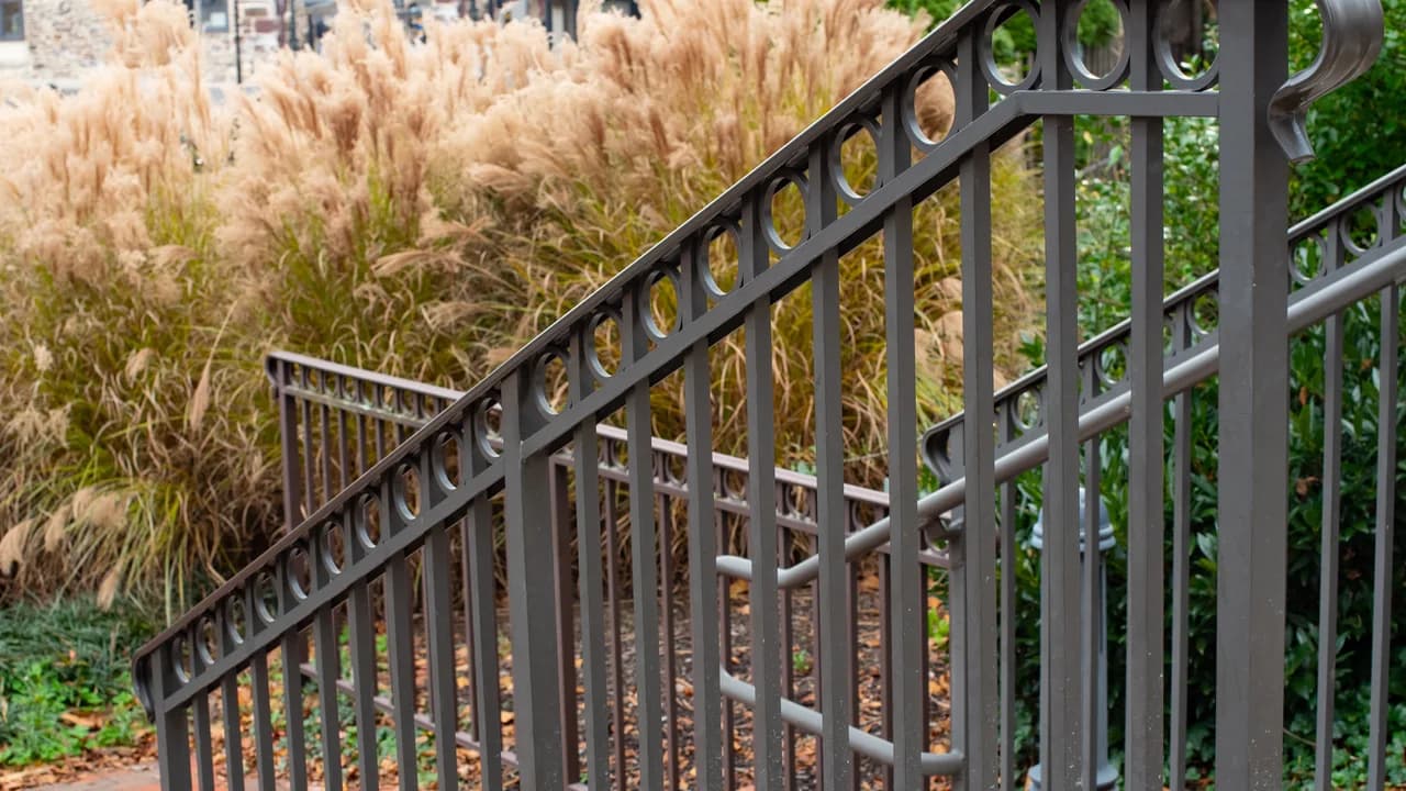 A backyard deck with a code-height railing